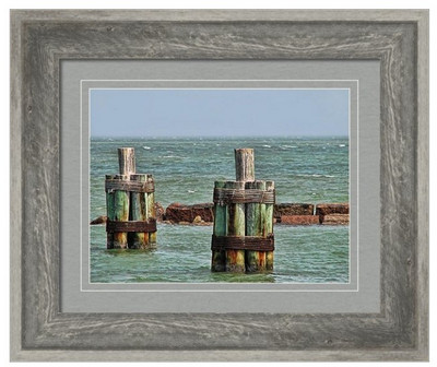 Endlessly Staring Out To Sea, photograph of seascape with pilings by Wendy J St Christopher